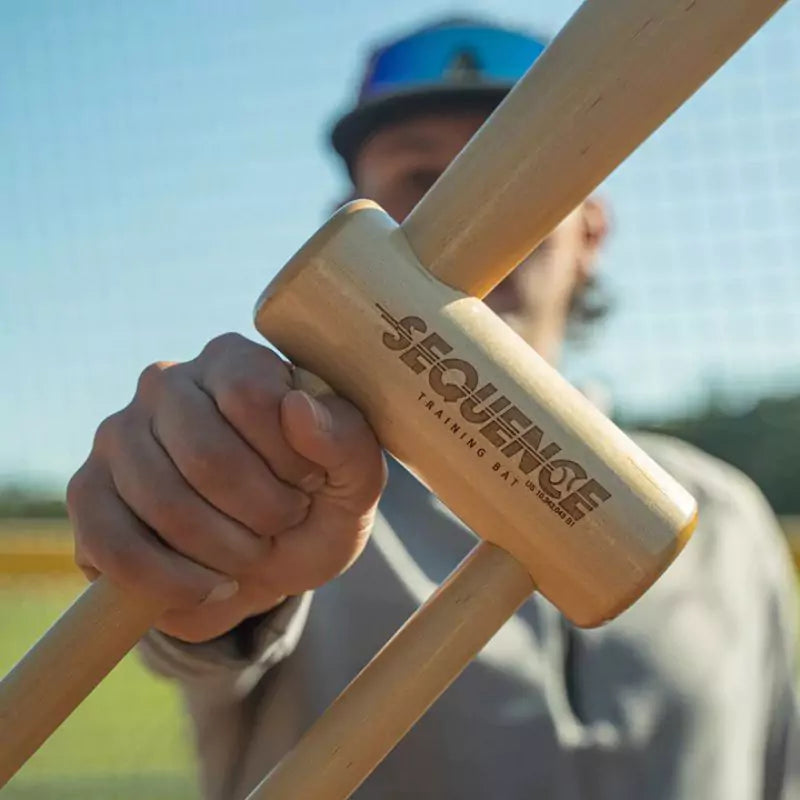 Sequence Bat Trainer for developing swing mechanics and improving hitting accuracy in baseball and softball