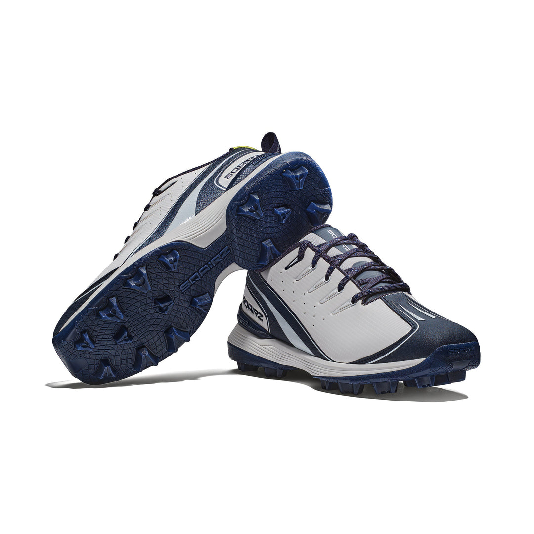 Full pair of navy, white SQAIRZ youth baseball and softball cleats showcasing molded outsoles, a wide toe box, and lightweight comfort for boys and girls during practices and games.
