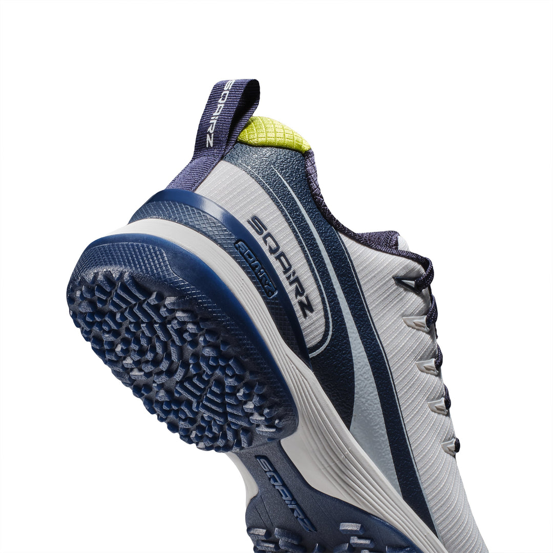 Detailed view of the navy SQAIRZ heel cup designed to reduce heel movement while enhancing comfort, balance, and stability during play.