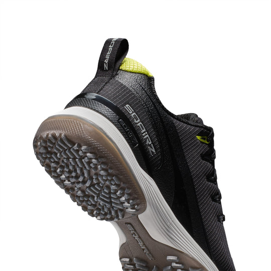 Heel view of SQAIRZ GFP2 womens black  softball turf shoe featuring integrated stability support for balance and comfort