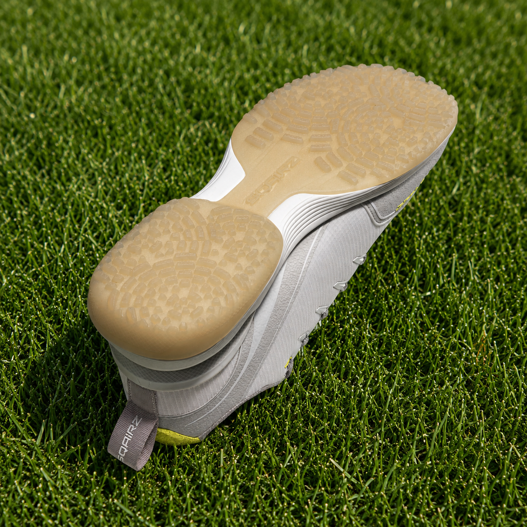Rear heel view of SQAIRZ GFP2 softball turf shoe featuring integrated stability support for balance and comfort