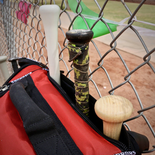 the dinger; baseball bat bag